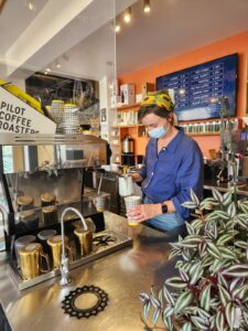 person serving coffee 