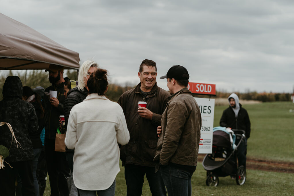 realtors standing around talking 