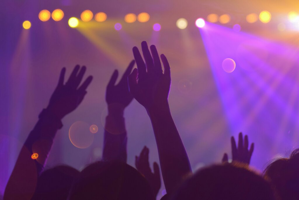 hands in the air at a concert