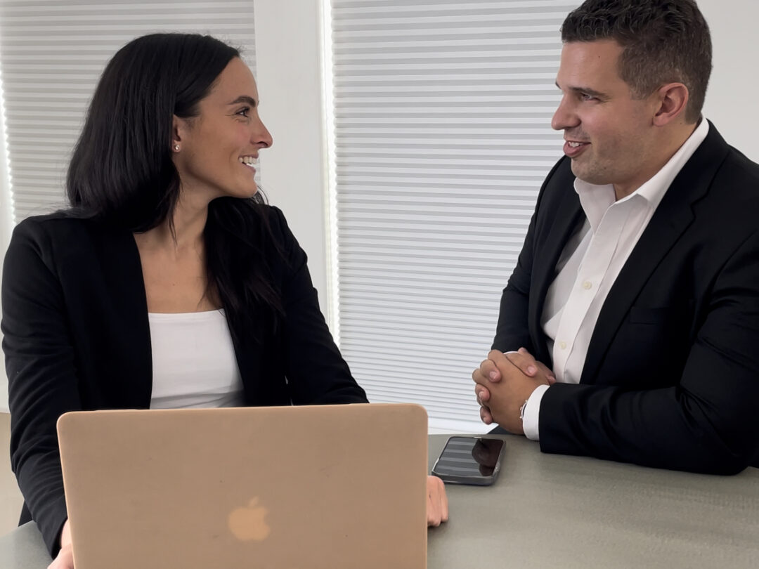 two realtors talk to each other